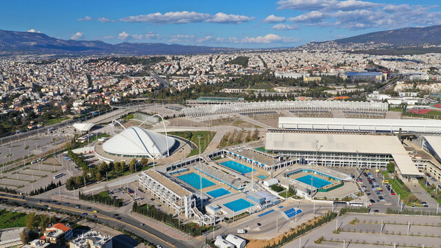 Aerial drone panoramic view of sports facilities of OAKA designed by Santiago Calatrava, Kalogreza, Attica, Greece