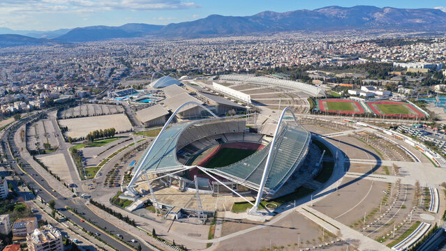 Aerial drone panoramic view of sports facilities of OAKA designed by Santiago Calatrava