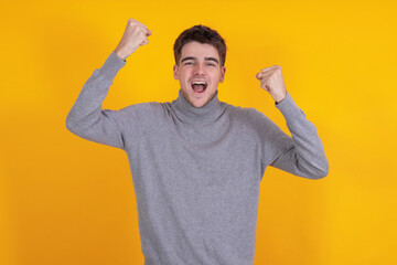 Fototapeta premium teenager celebrating isolated on background