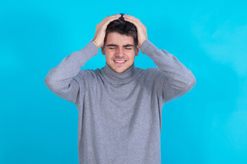young man isolated on background with sorry expression