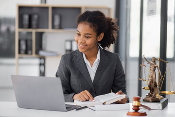 African American Lawyer woman working at office desk, concepts of law and legal services, law contract.