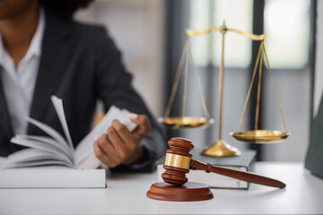 African American Lawyer woman working at office desk, concepts of law and legal services, law contract.