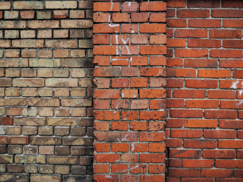 Fototapeta Dwukolorowy mur z cegły