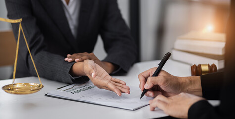 lawyer working with contract agreement at table office, law and justice concept, Selective focus.