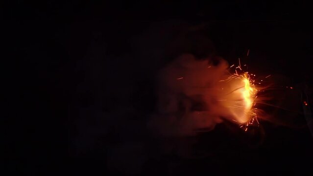 Burning Dynamite Fuse. Burning dynamite fuse on black background. Close Up Slow Motion Video.