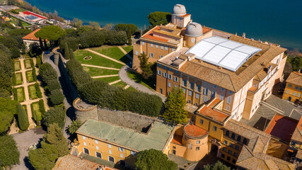 Aerial view of the Papal Palace of Castel Gandolfo, near Rome, Italy. The Apostolic Palace is a complex of buildings served for centuries as a summer residence for the Pope. It overlooks Lake Albano. 