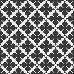Seamless abstract floral pattern. Modern vector graphic. Black and white background. Geometric leaf ornament. Stylish graphic pattern.