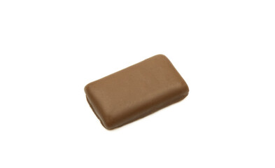 Small piece of chocolate isolated on white background.Single choco bar candy dessert