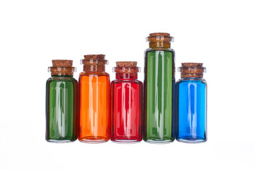 Many filled glass bottles on isolated background