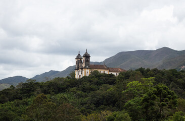 São Francisco de Paula Church surrounded by the forest in the historic town of Ouro Preto, Minas Gerais, Brazil - Igreja São Francisco de Paula, cidade histórica de Ouro Preto, MG, Brasil