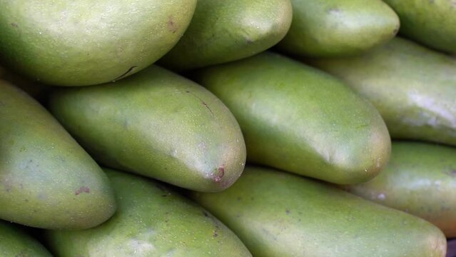 Mango in the market. Exotic fruit mango harvest.
