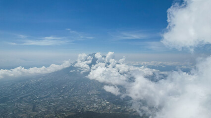 Naklejka na ściany i meble Aerial view of Mount Sumbing in Indonesia with noise cloud. High quality photo. Selective focus. 
