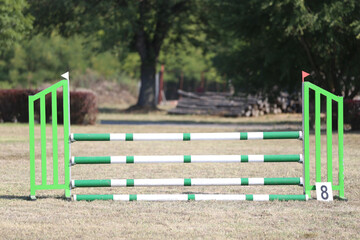 Show jumping poles obstacles, barriers, waiting for riders