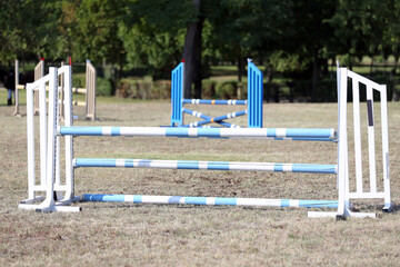 Show jumping poles obstacles, barriers, waiting for riders