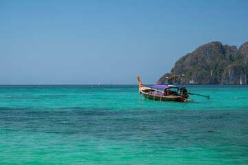 Traditional Thai longtail boats at Long Beach, Phi Phi island, Krabi Province, Andaman Sea.