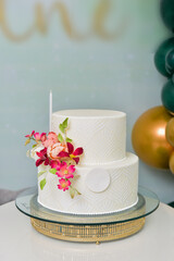white party cake with flowers
