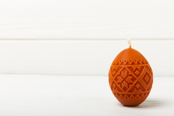 Easter eggs candles on a white background.Side view. Design. Holiday concept. Happy easter.Easter holiday concept.Decor for home and festive steel.Copy space. Place for text.