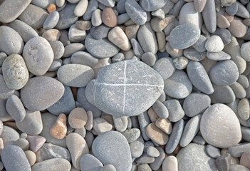 Background of gray stones on the seashore