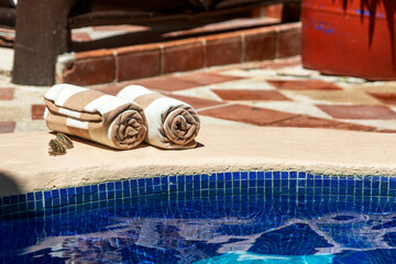 Beautiful pool with its set of towels and sunglasses, this is an ideal place to cool off in summer...