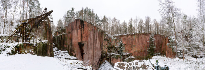 A snow-covered porphyry quarry on the Rochlitzer Berg in winter
