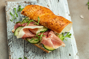 Sandwich with Jamon Serrano and spinach, Cured ham, spanish appetizer. banner, menu, recipe place...