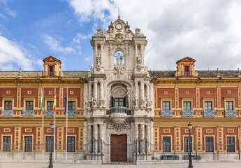 Fototapeta na wymiar Facade of the San Telmo Palace, seat of the Presidency of the Junta de Andalucia. Baroque building located in Seville between the 17th and 18th centuries to be the headquarters of a sailors' college