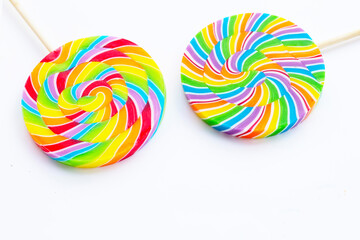 Fototapeta na wymiar Rainbow lollipop on white background.