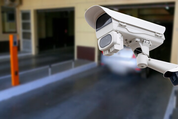 cctv camera installed on the parking lot to protection security. Copy space.