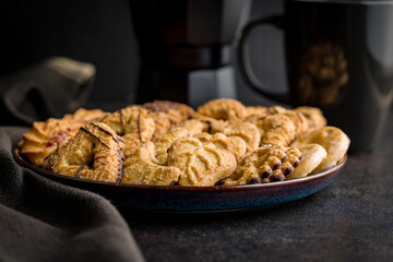 Assorted various cookies. Sweet biscuits on plate.