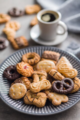 Assorted various cookies. Sweet biscuits on plate.