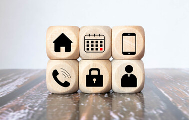 Hand putting the last piece of wooden blocks with the gear icon. Team work, unity, partnership or...