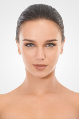 Perfecting perfection. Studio beauty shot of an attractive brunette woman.