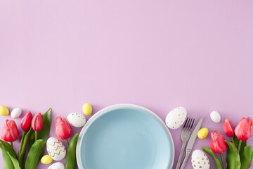 Easter decor concept. Top view photo of blue plate colorful eggs cutlery fork knife tulips on pastel lilac background with empty space