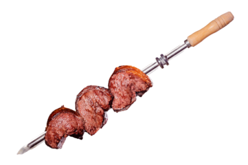 A brazilian traditional barbecue grilled rump cap on the stick - Picnha no espeto