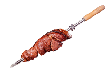 A brazilian traditional barbecue grilled rump on the stick - Alcatra no espeto