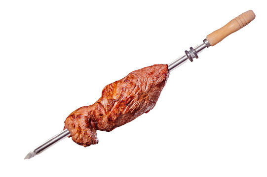 A brazilian traditional barbecue grilled ox termite on the stick - Cupim no espeto
