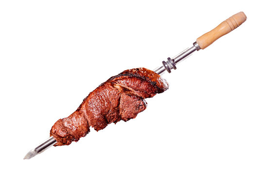 A brazilian traditional barbecue grilled rump on the stick - Alcatra no espeto