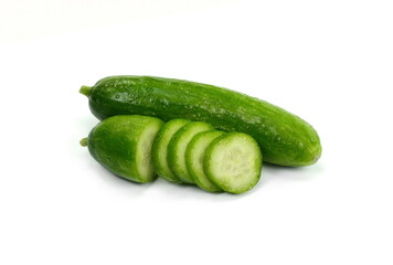 Cucumber and slices isolated over white background