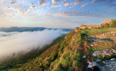 Naklejka premium Morning panorama cloudy view from top of Mangup Kale - historic fortress and ancient cave settlement in Crimea, Ukraine.