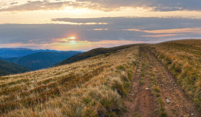 Obraz premium Carpathian Mountains (Ukraine) autumn landscape with country road. Panorama.