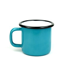 Blue enamel cup on white background isolation.