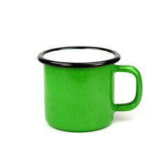 Green enamel cup on white background isolation.