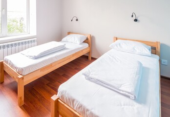 Fototapeta na wymiar Twin bed room in hotel