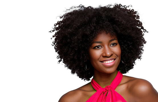 Portrait of a smiling African American teenage girl with curly afro hair, isolated