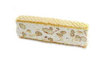 French soft nougat with strawberry flawour and almonds isolated on white background. Greek manolato. White nougat bar isolated.