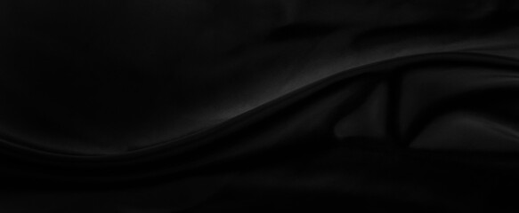 Obraz premium Black gray satin dark fabric texture luxurious shiny that is abstract silk cloth panorama background with patterns soft waves blur beautiful.