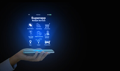 Hand holds a smartphone with virtual screen of superapp that serves multiple services as a one stop...