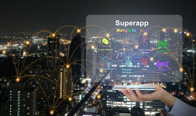 Hand holds a smartphone with virtual screen of superapp that serves multiple services as a one stop...
