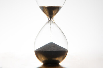 hourglass on a light background. time and minute measurement