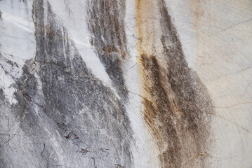 Fototapeta premium Rough texture of grey and light brown marble stone 